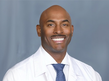 Dr. Raymond Swainson